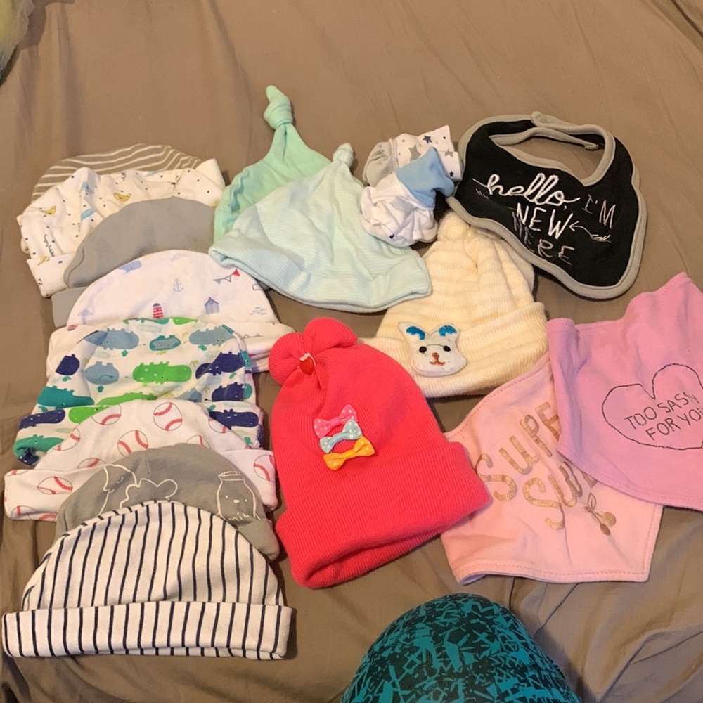 12 baby hates 2 hats 3 handkerchief things 2 socks